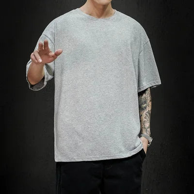 T-Shirt Homme Oversize Couleur Unie Coton Hip Hop Manches Courtes Casual Streetwear Fashion Été Tendance Confortable – Tee Shirt Premium Urban | Mode Homme Streetwear Premium