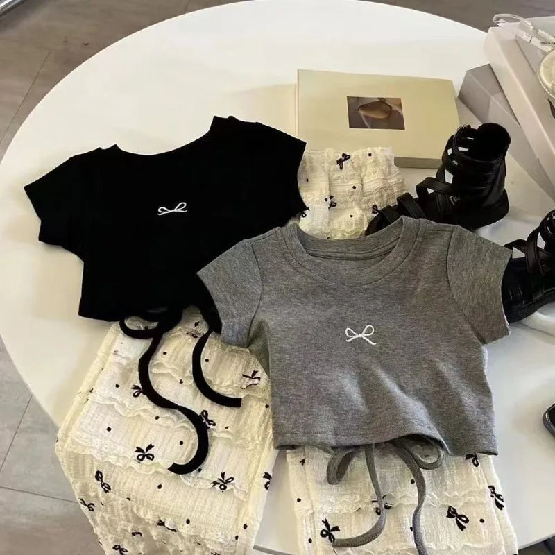 T-Shirt Nœud Style Coréen Fille + Pantalon Large – Tenue Été Tendance Enfant 2-8 Ans